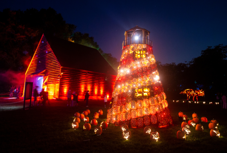 Walk the immersive pumpkin trail on the grounds of a 19th-century village at The Great Jack-o'-Lantern Blaze: Long Island.  Photo courtesy of the event