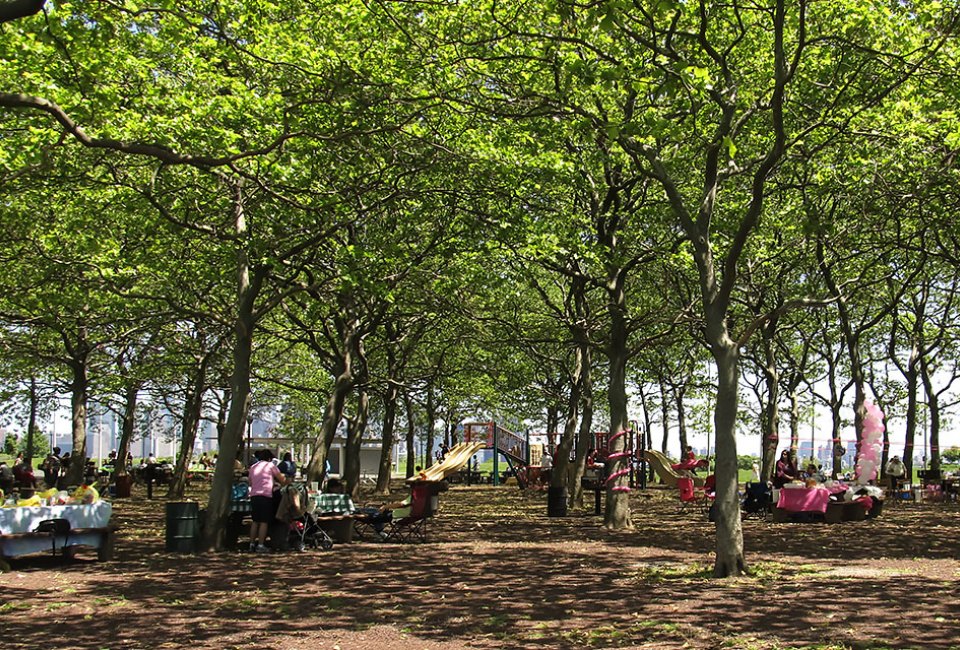 In addition to picnicking, Liberty State Park boasts a playground, riverfront paths, and stunning views of NYC. Photo by Ken Lund via Flickr