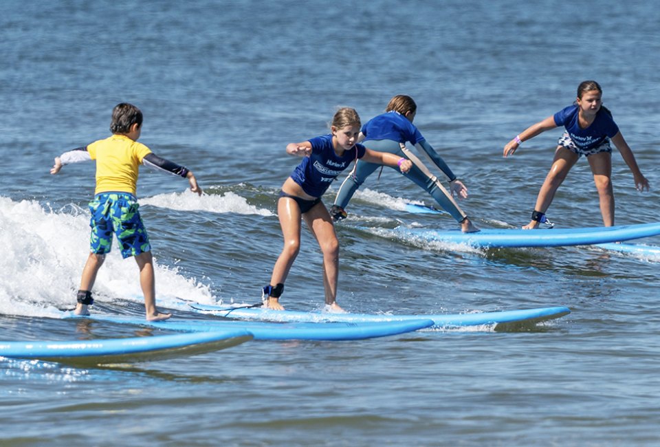 Learn to ride the waves with Skudin Surf in Long Beach. Photo by Jay Belsky