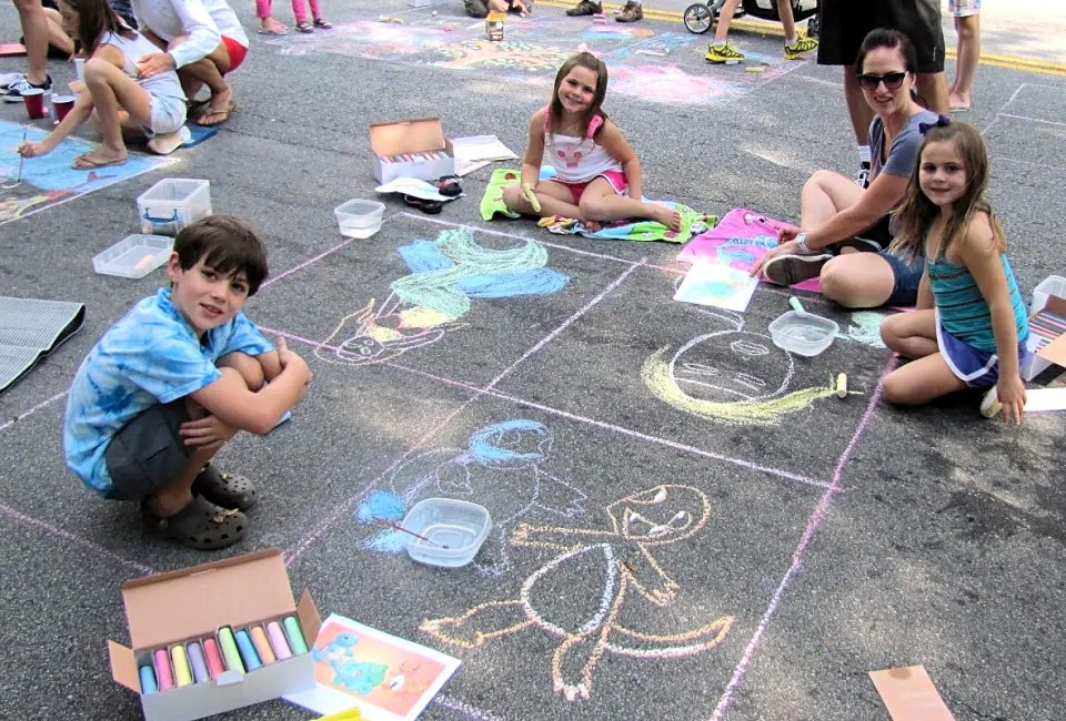 Labor Day Weekend in Atlanta: Dragon Con, Hot Air Balloons, and More Fun Things to Do Kids can take part in the Chalk Spot and decorate a square. Photo courtesy of Marietta Art in the Park