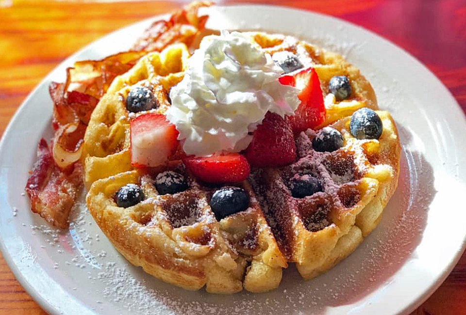 Tuck into a fluffy waffle or another delectable option during Mother's Day brunch at one of Toast Coffeehouse's Long Island locations.