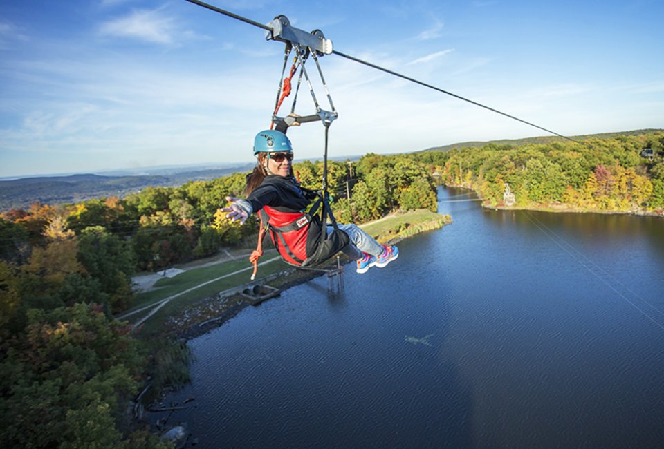 Mountain Creek  provides an unrivaled view from above the fall leaves by taking a ride along its zipline course. Photo courtesy of Mountain Creek