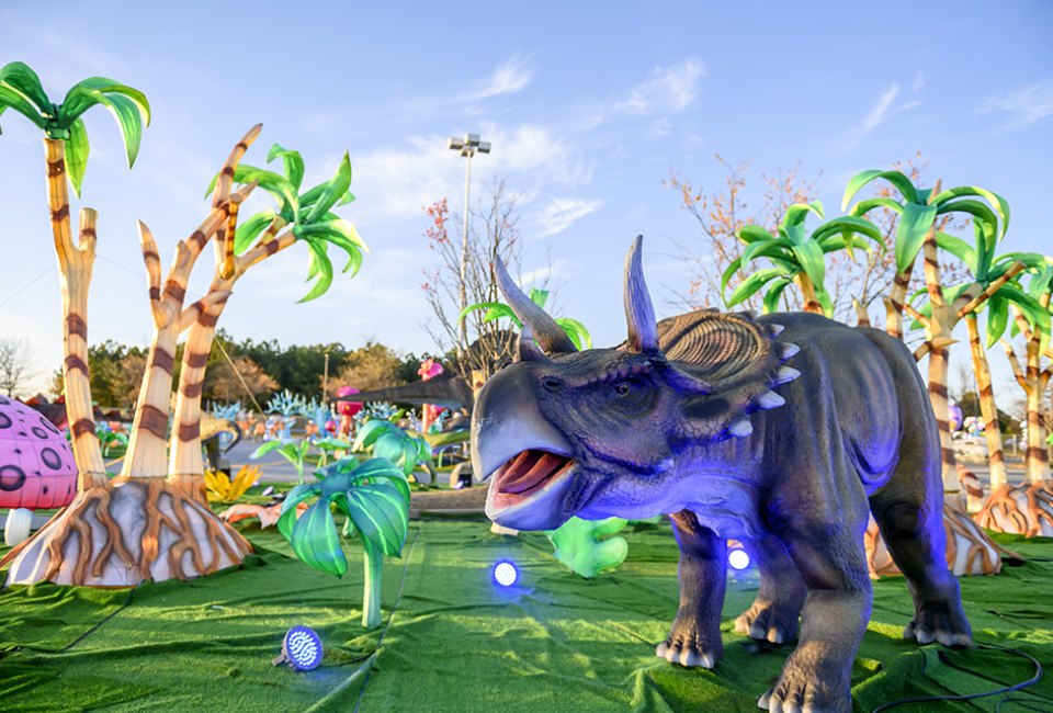 Go back to another time and make friends with dinosaurs! Check out LuminoCity Dino Safari in Orlando, now until June 16, 2024. Photo courtesy LuminoCity