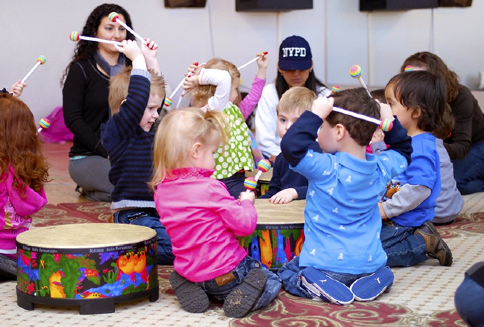 Kids feel the beat at a Musical Munchkins music class. 