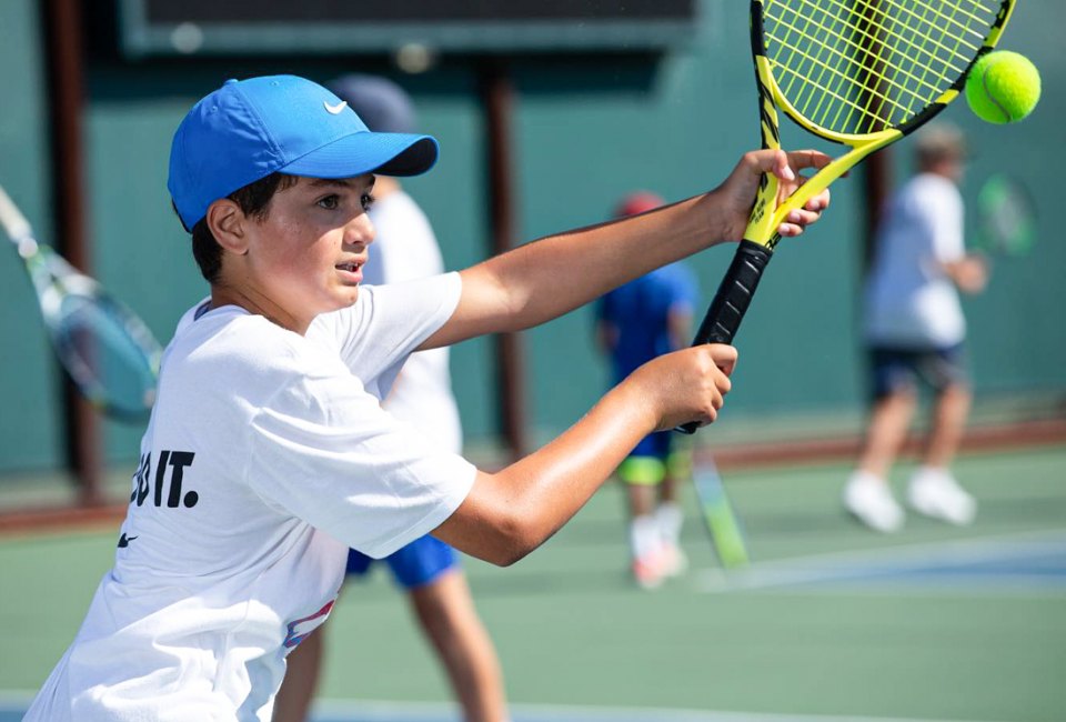 Kids can learn from top tennis coaches at Nike Tennis Camp. Photo courtesy of the camp