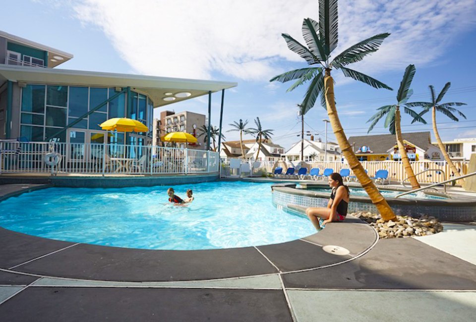 Take a dip in the pool at the Starlux, a family-friendly hotel in Wildwood, New Jersey. 