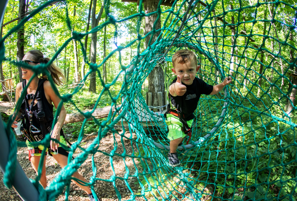 Make your way through the ropes course at TreEscape Aerial Adventure Park. Photo courtesy of the park 