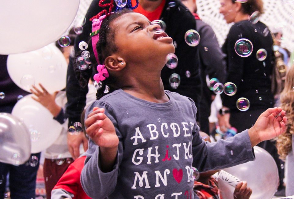Kids wear their coolest rock n’ roll costumes and dance, make party hats, and countdown to noon with a balloon drop! Photo courtesy of Young at Art Museum