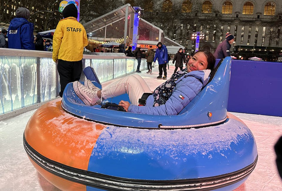 Slip, slide, smash, and crash during a ride on the Bryant Park Bumper Cars on Ice. Photo by Jody Mercier