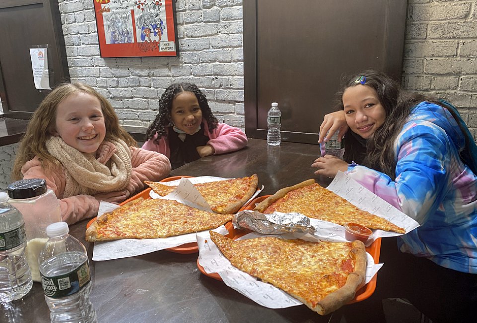 Feed a crowd with extra large, classic, New York-style pizza slices without breaking the bank. Photo by Jody Mercier