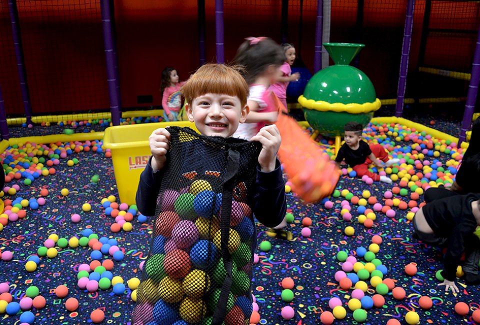 Party-goers burn tons of energy during an action-packed party at Laser Bounce. Photo by Sydney Ng