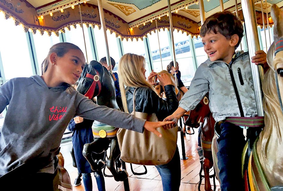 Jane's Carousel celebrates its 14th year in Brooklyn with free rides and face painting on Saturday, May 3, 2025. Photo by Sara M.