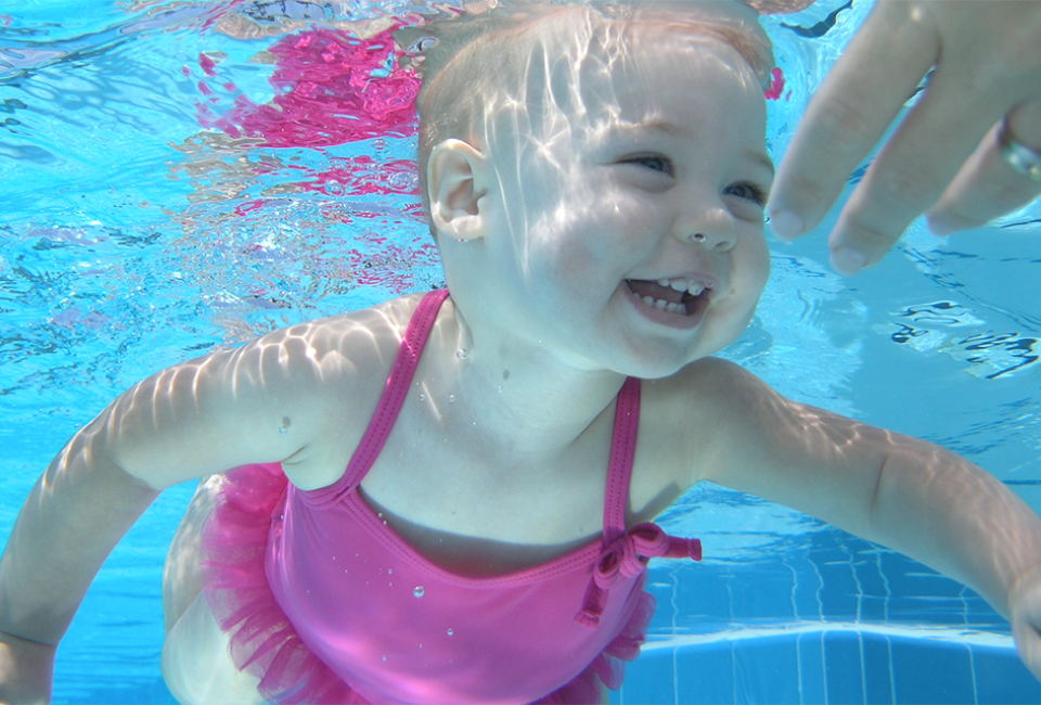 Swim lessons for babies at places like Southwest Aquatics are crucial for life-saving skills. Photo courtesy of the school