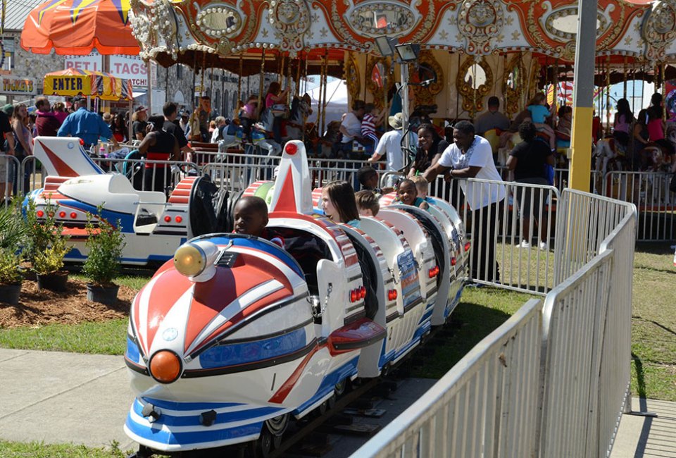 The youngest family members enjoy the Kiddie Korral at the Florida Strawberry Festival! Photo courtesy of the festival