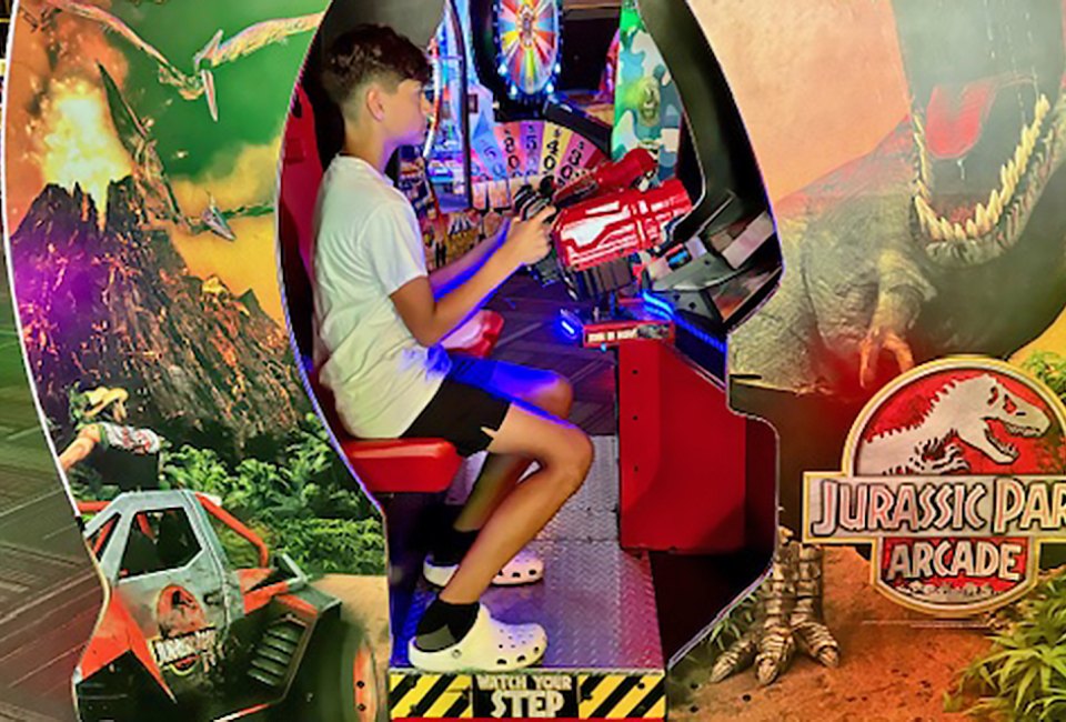 Stay cool and dry this summer while battling dinosaurs at an Orlando arcade! Photo by author