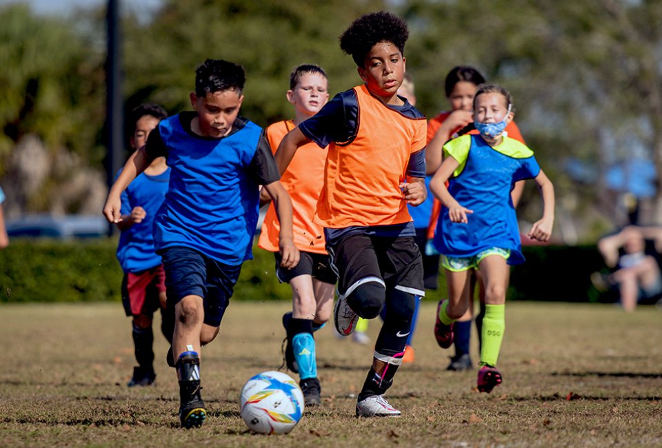 Get out on the court or hit the soccer fields with TUF Athletics Basketball & Soccer Camps. Photo courtesy of the camp