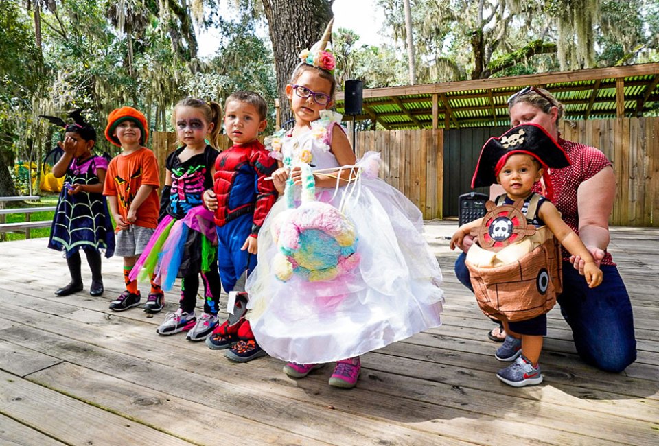 Halloween Weekend Things To Do in Orlando with Kids: Monster Jam, Orlando Air & Space Show, Trick-or-Treat At Zoo Boo Bash, families show off Halloween costumes and trick-or-treat while enjoying the fun of Central Florida Zoo. Photo courtesy of the zoo