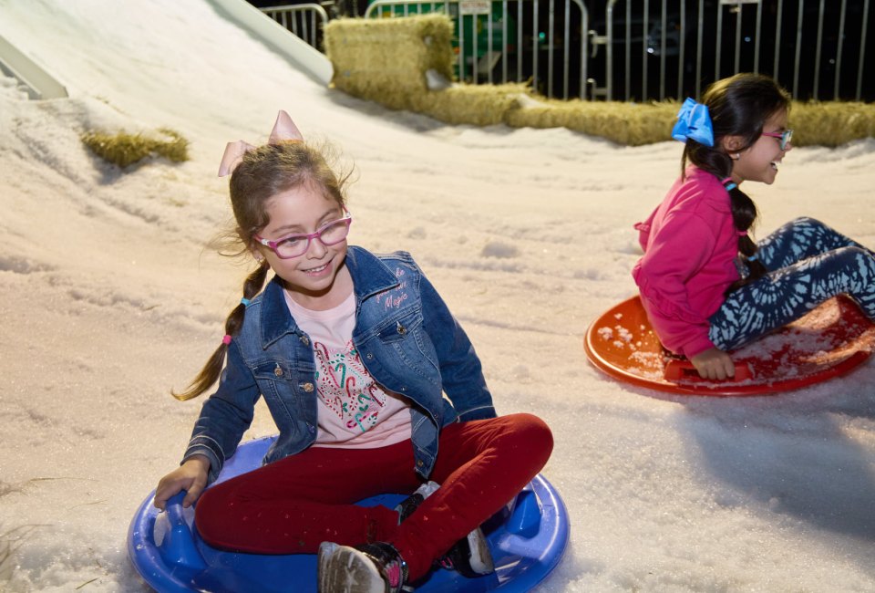 Enjoy snow tubing and other holiday activities at Christmas In The Park in Winter Garden. Photo courtesy Winter Park Chamber of Commerce