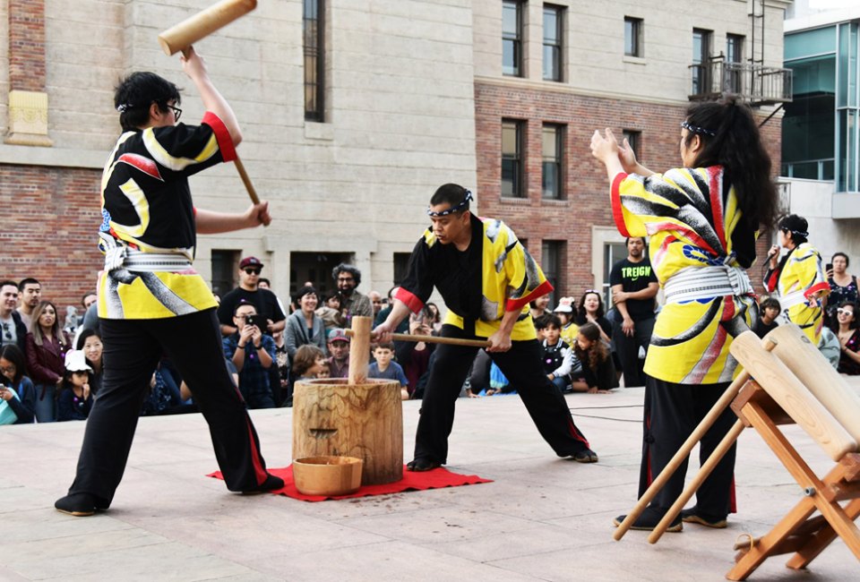 Mochitsuki (rice pounding) demos create mochi samples at the Oshogatu Family Festival. Photo courtesy of the Japanese American National Museum
