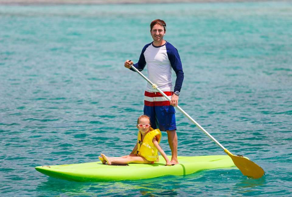 Take a paddleboard lesson. Photo via Bigstock