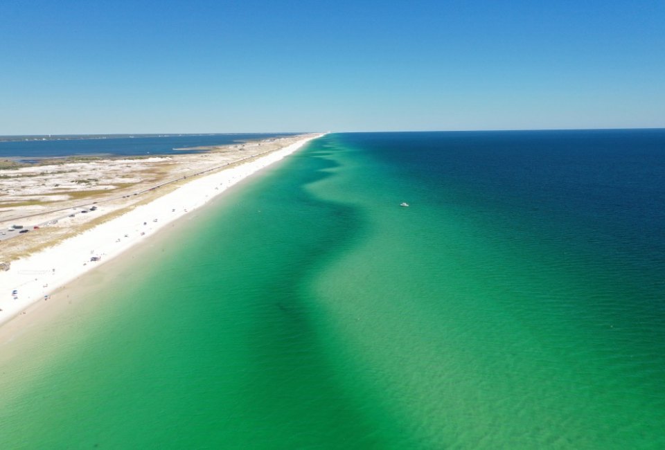 Miles upon miles of endless gorgeous beach and stunning emerald water; that's Pensacola Beach!