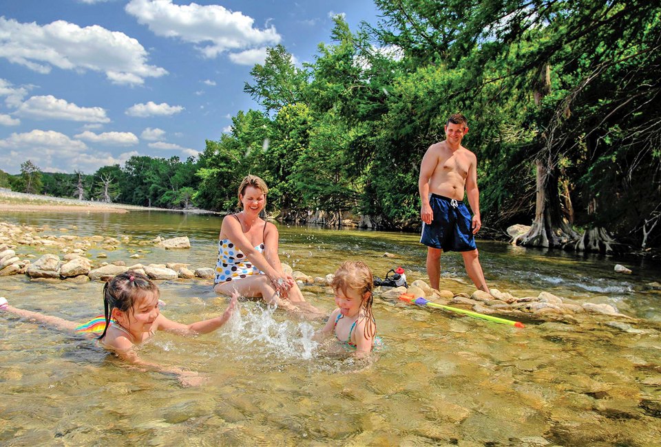 Pedernales Falls State Park with Kids: A Texas Camping Getaway Splashing in the river is a great way to cool down after a long hike. Photo by Chase A. Fountain/ Texas Parks and Wildlife Department