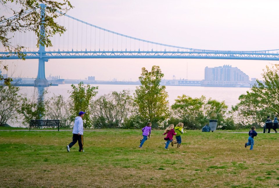 Fishtown families flock to Penn Treaty Park for the waterfront views, special events, and open space. Photo by M. Kennedy for Visit Philadelphia