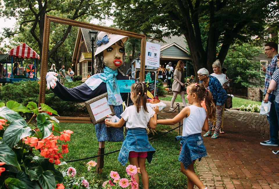 Over 100 scarecrows line the brick pathways of Peddler's Village. during its annual autumn event Scarecrows in the Village. Photo by Chris Burrows