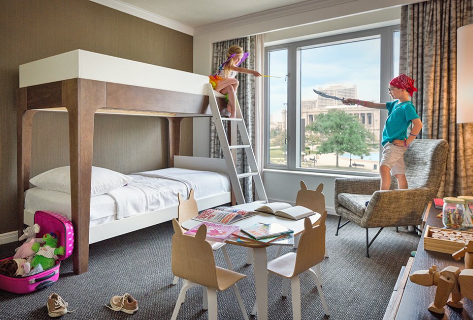 Try the indoor s'mores kit and the  Rocky-style robes for kids at the Logan Hotel.