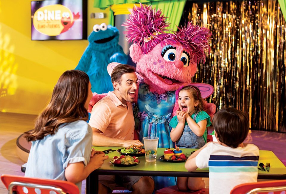 Enjoy a delicious buffet meal with your favorite furry friends, where all moms receive a free flower. Photo courtesy of Sesame Place