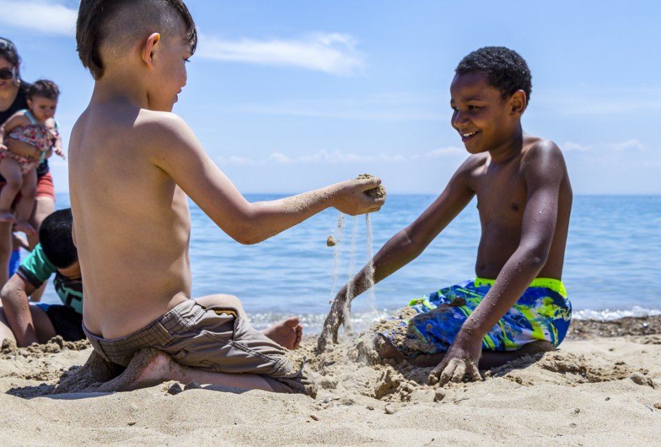 Playing on the Beach in Chicago photo by Don Harder (CC BY-NC-ND 2.0)