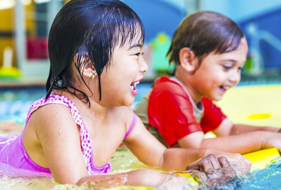 Toddler and baby swimming lessons are offered all throughout the DC area. Photo courtesy of Aqua-Tots Swim Schools 