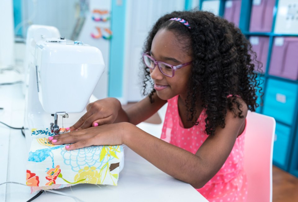 Learning to sew is just part of the fun at Creative Youth Summer Camp. Photo courtesy of the camp