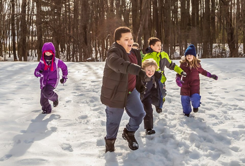 Kids can get out and explore, keeping busy on winter and spring breaks with the top school break camps in Boston! February Vacation Week program photo by Phil Doyle, courtesy of Mass Audubon
