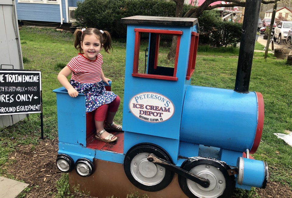 Kids love to sit in the train engine at Peterson's Ice Cream Depot in Clifton, Virginia. Photo courtesy of Jennifer Marino Walters