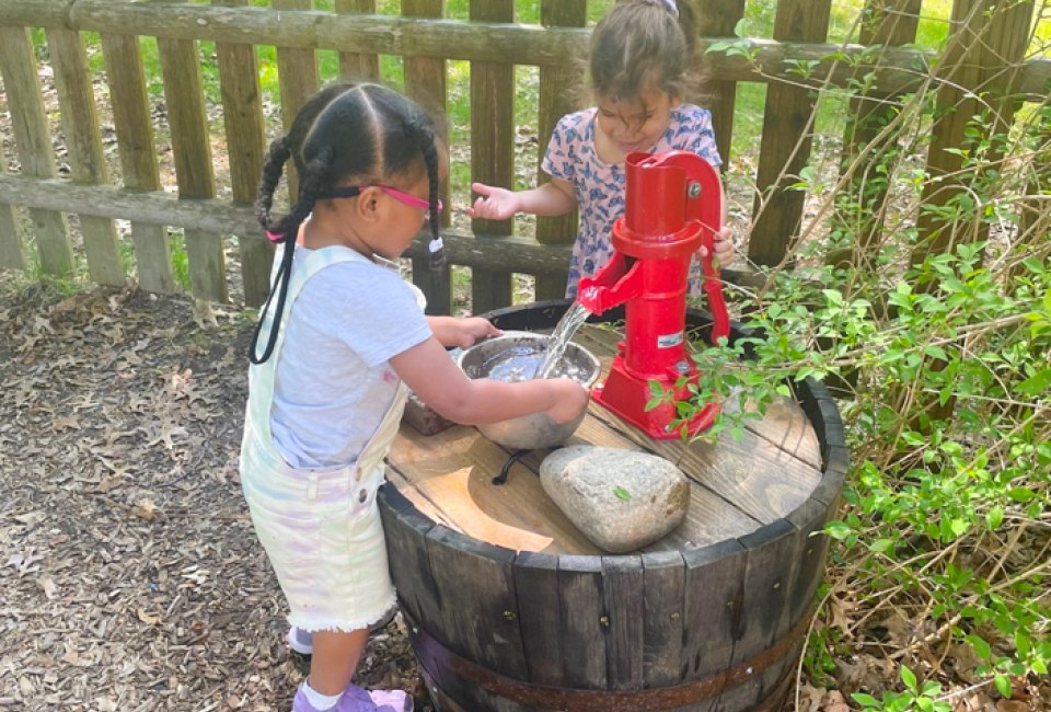 Image of young kids at water pump - Things To Do with Preschoolers