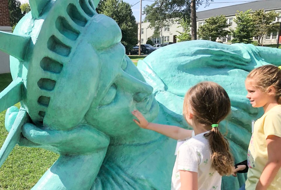 Kids are allowed—and even encouraged—to touch Reclining Liberty. Photo courtesy of the Museum of Contemporary Art in Arlington 