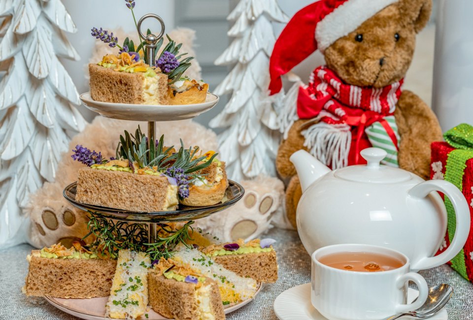 Pinkies up, it's time for holiday tea! Photo courtesy of the Ritz-Carlton