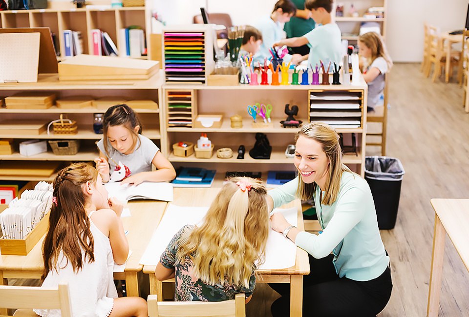 Kids work in small, interactive instruction groups in a Montessori environment. Photo courtesy of the Polis World School