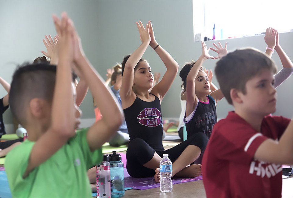Powerflow Yoga Kids offers classes for all ages, from babies to teens.