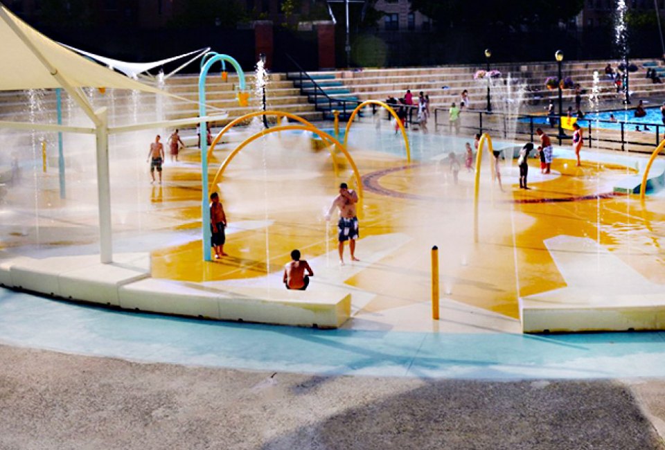 The splash pad at Crotona Park includes geysers that shoot straight up, as well as gentle misters for little kids.