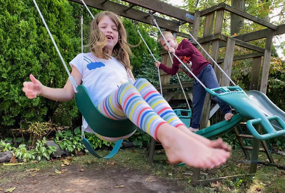A backyard swing set becomes an obstacle course with a little creativity. Photo by Rose Gordon Sala