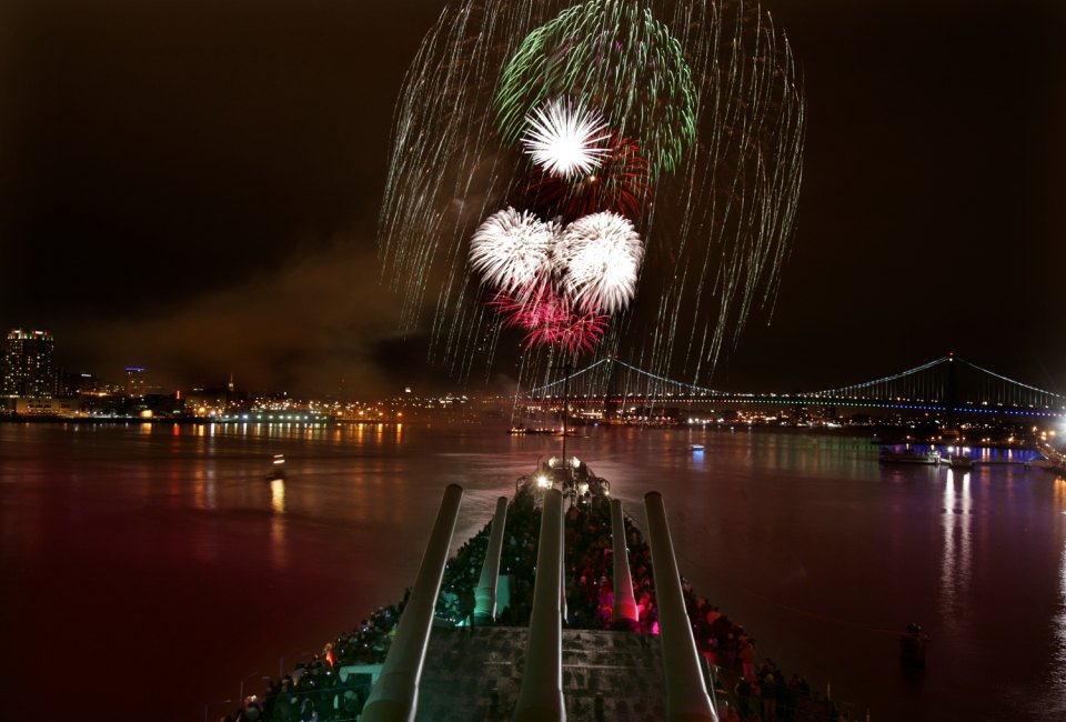 Battleship New Jersey offers incredible views of the Fireworks from across the bridge. Photo courtesy of R. Kennedy for Visit Philadelphia