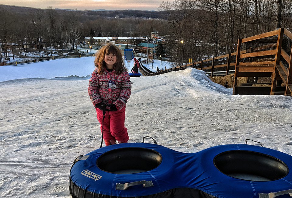 Snow tubing is one of many fun winter activities to enjoy at the all-seasons Rocking Horse Ranch with kids. 
