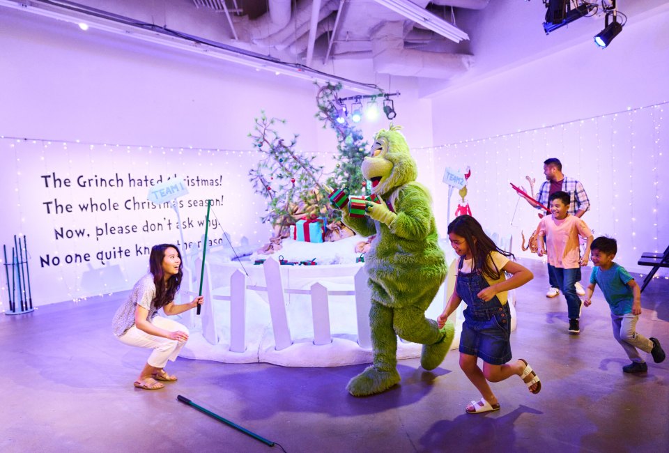 Don't let The Grinch steal your presents at the Dr. Seuss Experience! Photo courtesy of Fever