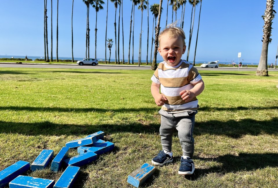Play lawn games at the Hilton Santa Barbara while looking at the ocean and palm trees. Photo Courtesy of Gina Ragland