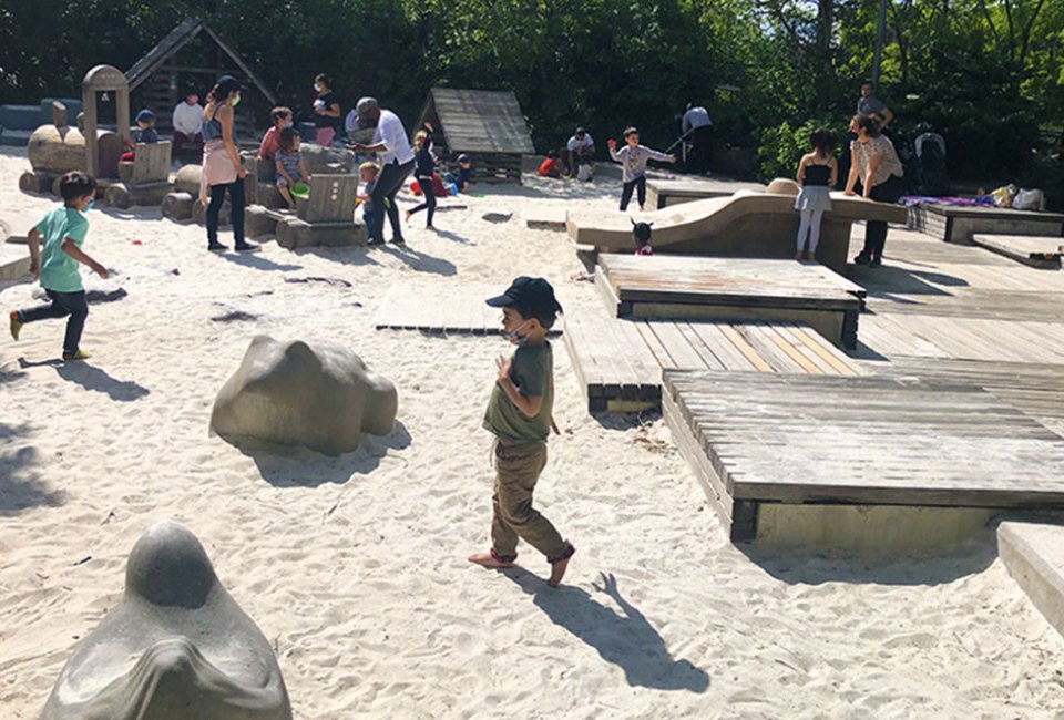 Sandbox Village at Brooklyn Bridge Park's Pier 6 is a sand city with playhouses and and a water spray area. Photo by Diana Kim