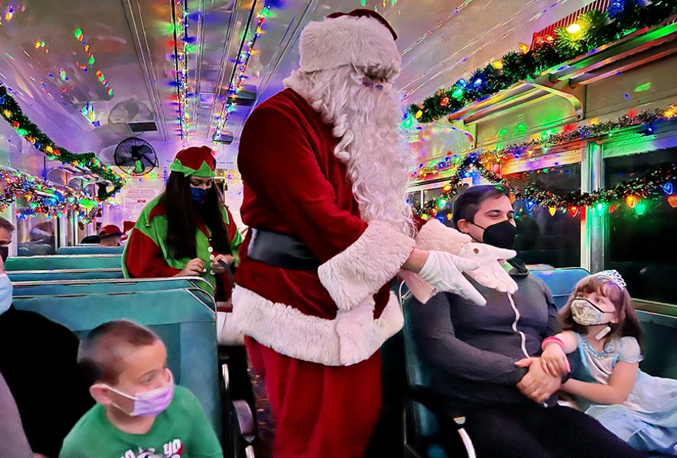 Twinkling lights, jolly old St. Nick, and plenty of sweet treats await during a ride on The Polar Express Christmas train.