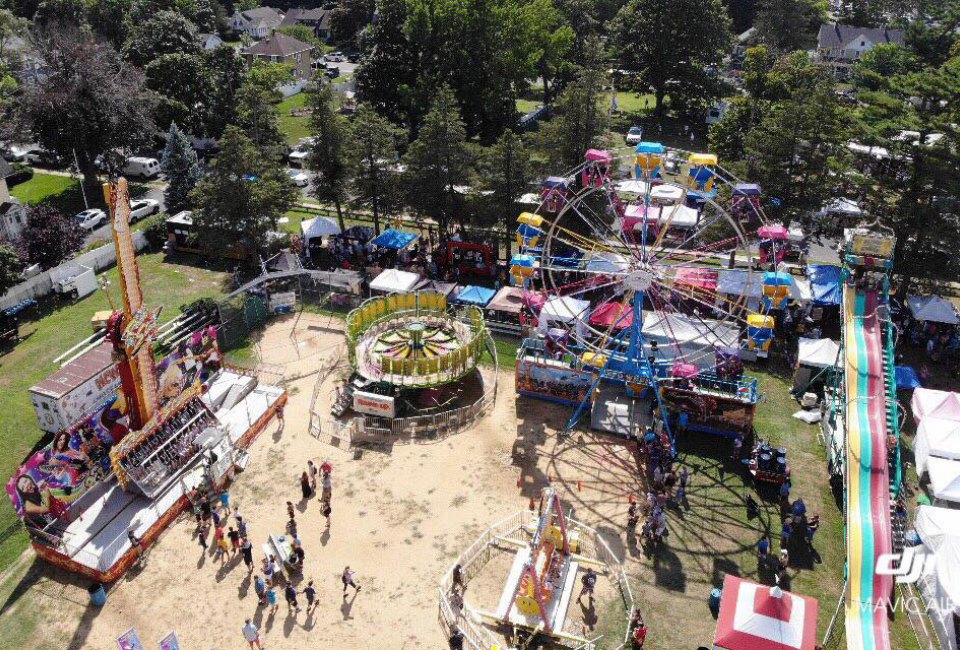 Thrill to the carnival atmosphere at Sayville Summerfest. Photo by Mavicair