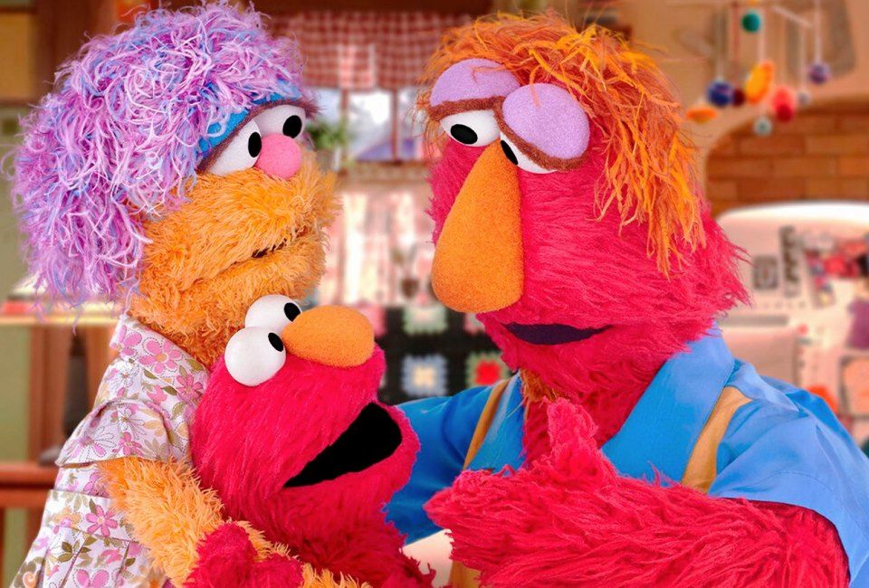 Elmo and his parents on Sesame Street. Image courtesy of PBS 